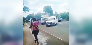 In this screenshot from a video, a heavy dump truck attempts to evade authorities during a high-risk pursuit on Oct. 10, 2026. The chase, which endangered motorists and government enforcers, prompted the Land Transportation Office – Region 6 to suspend the driver’s license for 90 days, with permanent revocation now a possibility.