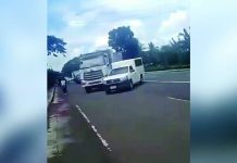 This screengrab from viral video footage capture a government service vehicle operated by the Iloilo Provincial Anti-Overloading Task Force pursuing and attempting to block a white dump truck allegedly transporting quarry materials along the highway in Zarraga, Iloilo on Saturday afternoon, Oct. 10, 2026.