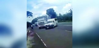 This screengrab from viral video footage capture a government service vehicle operated by the Iloilo Provincial Anti-Overloading Task Force pursuing and attempting to block a white dump truck allegedly transporting quarry materials along the highway in Zarraga, Iloilo on Saturday afternoon, Oct. 10, 2026.