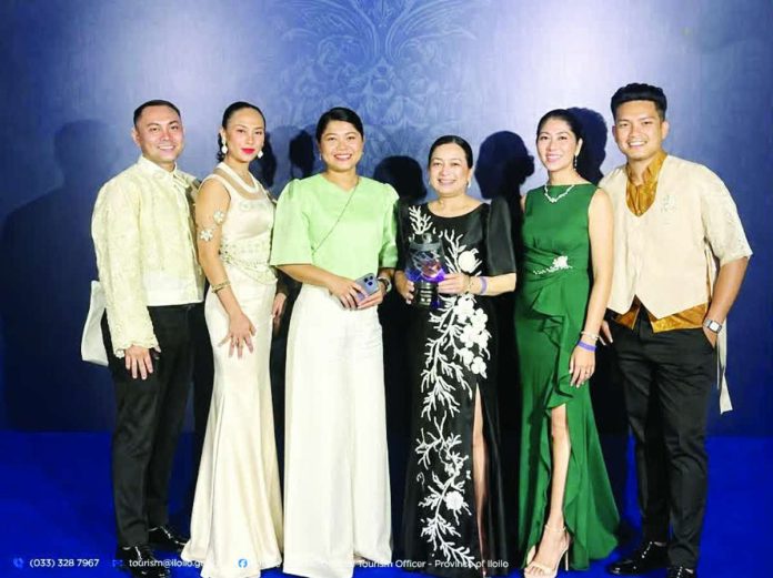 ime_events_tourism_compressed_resized Representatives of the Municipality of Tigbauan, Iloilo celebrate their triumph at the 2026 ATOP National Tourism Pearl Awards in Ormoc City, Leyte, on October 21, 2026. Tigbauan emerged as grand winner in the Best International Event Hosting category, placed second runner-up in the Best Tourism-Oriented Local Government Unit category, and earned a finalist distinction in Best Local Events Hosting, underscoring the town’s growing prominence in Philippine tourism. ILOILO PROVINCIAL TOURISM OFFICE