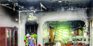 The aftermath of a fire that struck an unoccupied house along Rainbow Street in Barangay Lopez Jaena Sur, La Paz, Iloilo City on Monday, Oct. 12, 2026. Responding firefighters quickly contained the blaze, preventing it from spreading to adjacent homes. ALLEN ANIMAS/PN