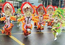 Taculing rules MassKara 2026 street dance and arena competition Dancers from Barangay Taculing perform energetic choreography despite the wet streets during the MassKara Festival 2026’s Street Dance and Arena Competition in Bacolod City on Sunday, October 18. Taculing emerged the grand champion in the barangay category, taking home the P1-million prize. BACOLOD CITY COMMUNICATIONS OFFICE PHOTO