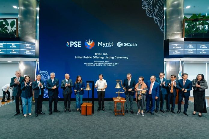 Philippine President Ferdinand Marcos, Jr. (Center) leads the bell-ringing ceremony of Mynt, Inc., the parent company of GCash. From left to right joining the ceremony are: Ayala Corporation Director Fernando Zobel de Ayala, Mynt Chief Financial Officer Evelyn Ng, Ayala Corporation President and CEO Bong Consing, Ayala Corporation Chairman Jaime Augusto Zobel de Ayala, Mynt Chairman Ernest Cu, Mynt President and CEO Martha Sazon, Philippine Stock Exchange, Inc. Chairman Jose Pardo, PSE Director Ma. Vivian Yuchengco, PSE President and CEO Ramon Monzon, Monetary Board Member Romeo Bernardo, Finance Secretary Frederick Go, Securities and Exchange Commission Chairman Francis Ed Lim, PSE COO Atty. Roel A. Refran, and PSE Issuer Regulation Division Head Atty. Marigel M. Baniqued-Garcia.