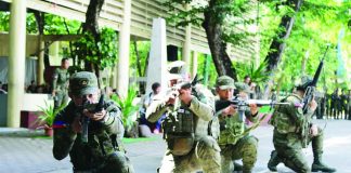 1,300 Iloilo reservists bolster disaster, defense readiness READY TO DEFEND, PREPARED TO RESPOND. Philippine Army reservists stand in formation and demonstrate tactical combat capabilities during the grand mustering at Iloilo Science and Technology University in La Paz, Iloilo City, on July 5, 2026. The gathering of nearly 1,300 citizen-soldiers underscored the vital role of the military reserve force in strengthening territorial defense, disaster response and emergency preparedness across Iloilo. AJ PALCULLO/PN