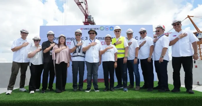 pagibig megawide Pag-IBIG Fund and the Department of Human Settlements and Urban Development (DHSUD) marked the first day of National Shelter Month with the topping-off of two residential towers at JAB Residences in Dasmariñas City, Cavite, on Thursday, October 1. Developed by Megawide Dreamrise Residences, Inc., JAB Residences features 17 five-story residential buildings with nearly 4,000 condominium units for Filipino workers and their families under President Ferdinand R. Marcos Jr.’s Expanded Pambansang Pabahay para sa Pilipino (Expanded 4PH) Program. In photo, from left: Megawide Group CFO Jez dela Cruz; PH1 World Developers President Gigi Alcantara; Dasmariñas City Mayor Elpidio “Third” Austria Barzaga III; Cavite 4th District Rep. Jennifer Austria-Barzaga; Megawide Chairman, President and CEO Engr. Edgar B. Saavedra; DHSUD Secretary and Pag-IBIG Fund Board Chairman Jose Ramon P. Aliling; Pag-IBIG Fund CEO Marilene C. Acosta; Megawide COO Frederick Tan; Megawide Chief Business Development Officer Jaime Feliciano; Pag-IBIG Fund Deputy CEO Alexander Hilario G. Aguilar; DHSUD Senior Undersecretary Eduardo Robles Jr.; and Pag-IBIG Fund Deputy CEO Benjamin R. Felix Jr.