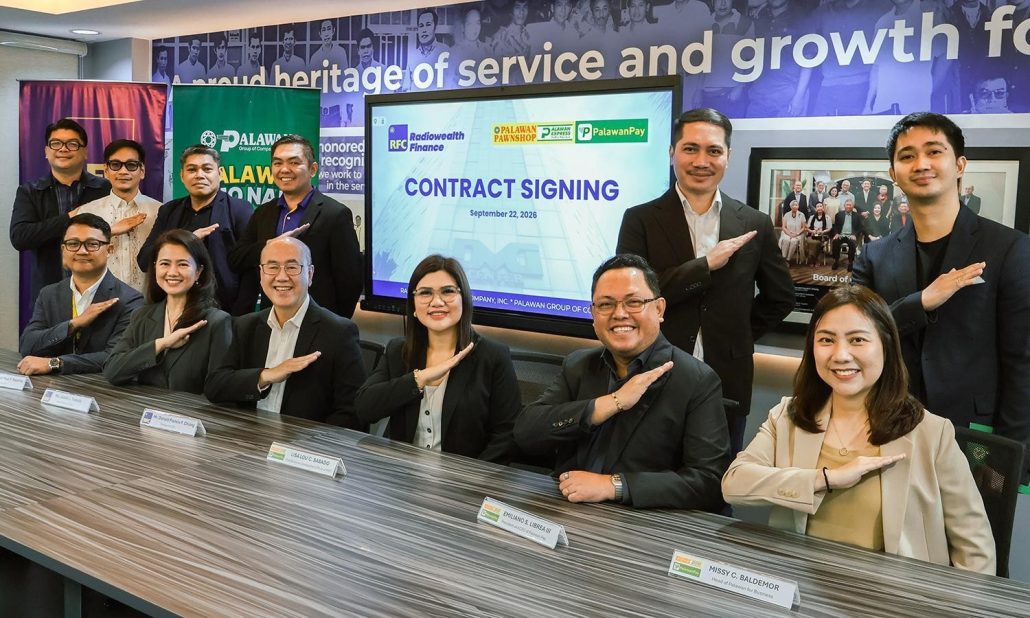 Radiowealth Finance and Palawan Group executives strengthen their collaboration to expand access to financial services.