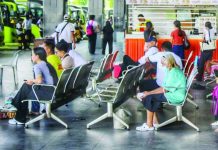 DOH-6 warns of severe flu complications amid rising cases; children, elderly face heightened risks An elderly passenger wearing a face mask sits among commuters waiting for a bus ride at the Ceres terminal in Jaro, Iloilo City. The Department of Health Region 6 urged senior citizens and young children to observe strict preventive measures, including wearing properly fitted face masks in crowded areas, as influenza-like illnesses continue to surge across the region. ALLEN ANIMAS/PN