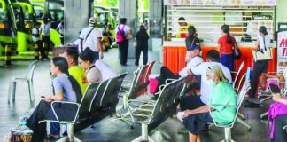 DOH-6 warns of severe flu complications amid rising cases; children, elderly face heightened risks An elderly passenger wearing a face mask sits among commuters waiting for a bus ride at the Ceres terminal in Jaro, Iloilo City. The Department of Health Region 6 urged senior citizens and young children to observe strict preventive measures, including wearing properly fitted face masks in crowded areas, as influenza-like illnesses continue to surge across the region. ALLEN ANIMAS/PN