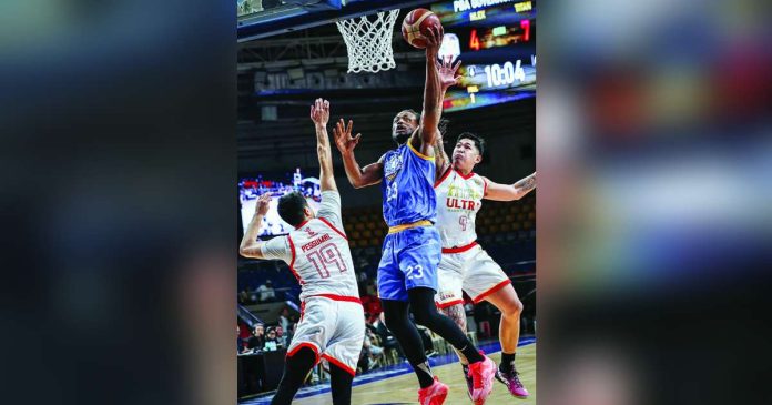 sports NLEX copy_compressed_superimposed NLEX Road Warriors import Deonte Burton attacks the basket against Titan Ultra Giant Risers defender Von Pessumal during their PBA Season 50 Governors’ Cup encounter at the Ninoy Aquino Stadium. PBA