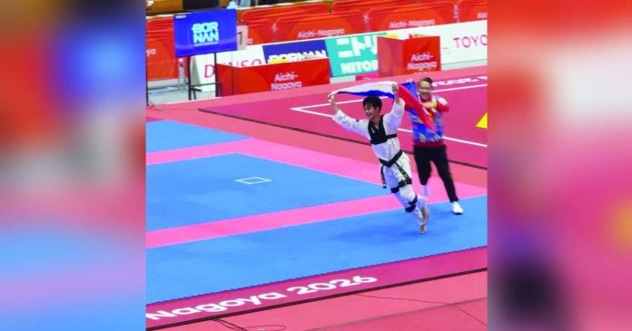 sports Yape_superimposed Jeus Gabriel Derick Yape celebrates after capturing the mixed individual virtual taekwondo gold medal at the 2026 Asian Games in Japan. POC MEDIA POOL