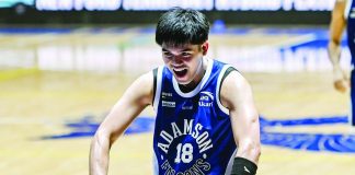 Adamson University Soaring Falcons’ Matthew Erolon celebrates after sinking a crucial go-ahead three-pointer against De La Salle University Green Archers in their UAAP Season 89 men’s basketball encounter. UAAP