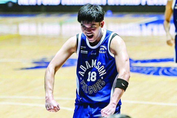 sports_Adamson.JPG_resized Adamson University Soaring Falcons’ Matthew Erolon celebrates after sinking a crucial go-ahead three-pointer against De La Salle University Green Archers in their UAAP Season 89 men’s basketball encounter. UAAP