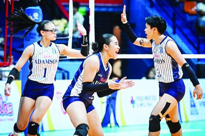 sports_Adamson_compressed_resized Shaina Nitura and the Adamson University Lady Falcons celebrate their second consecutive V-League Collegiate Challenge championship after defeating the University of Santo Tomas Golden Tigresses in four sets in Game 2 of the finals at the Playtime FilOil Centre in San Juan. Frances Mordi led the title defense with 21 points and earned both the Conference MVP and Finals MVP honors. V-LEAGUE