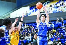 Ateneo de Manila University Blue Eagles rookie Kieffer Alas pulls up for a three-point shot against Far Eastern University. Alas scored 21 points, including two crucial free throws in the closing seconds, to lift Ateneo to a 75-72 victory. UAAP