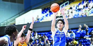 Ateneo de Manila University Blue Eagles rookie Kieffer Alas pulls up for a three-point shot against Far Eastern University. Alas scored 21 points, including two crucial free throws in the closing seconds, to lift Ateneo to a 75-72 victory. UAAP