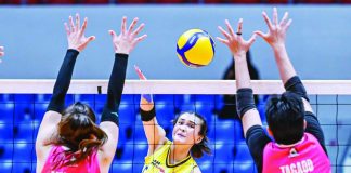 Capital1 Solar Spikers’ Mhicaela Belen attacks against the defense of Akari Chargers during their five-set PVL encounter at the Ynares Center in Antipolo City. PVL