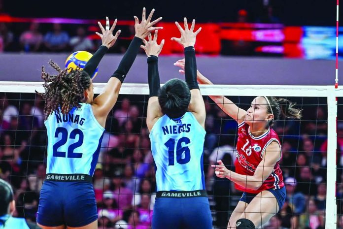 Choco Mucho Flying Titans’ Cherry Rondina-Rosales attempts an attack against the defense of Capital1 Solar Spikers during their PVL All-Filipino Conference opener at the SM Seaside Cebu Arena. Choco Mucho rallied from two sets down to secure a dramatic five-set victory. PVL