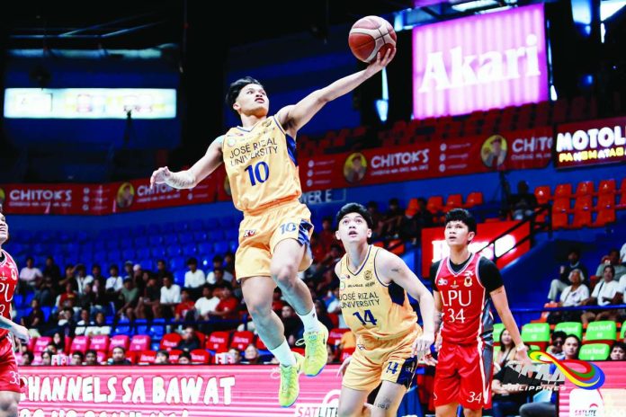 sports_JRU_compressed_resized Jose Rizal University Heavy Bombers’ Lawrence Mangubat soars for a layup during their NCAA Season 102 men’s basketball campaign. Returning from a shoulder injury, Mangubat sank two crucial free throws in the closing seconds to help JRU escape Lyceum, 81-78, and seize solo leadership of Group A. NCAA