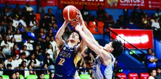 Jose Rizal University Heavy Bombers’ Chris Hubilla battles through the defense of the Arellano University Chiefs during their NCAA Season 102 men’s basketball encounter. NCAA