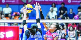 Negrense Bernadeth Pons of the Creamline Cool Smashers scores against the defense of Ilongga Glaudine Trongcoso of the ZUS Coffee Thunderbelles during their PVL 2026-27 All-Filipino Conference encounter. PVL