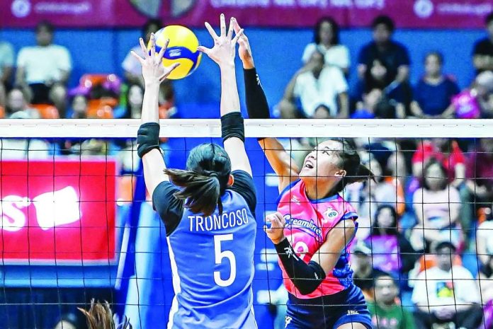 sports_Pons_compressed_resized Negrense Bernadeth Pons of the Creamline Cool Smashers scores against the defense of Ilongga Glaudine Trongcoso of the ZUS Coffee Thunderbelles during their PVL 2026-27 All-Filipino Conference encounter. PVL