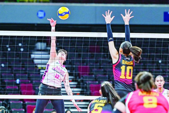 sports_Power.JPG_resized Akari Power Chargers’ Christine Joy Soyud launches an attack against the defense of PLDT High Speed Hitters during their 2026-27 PVL All-Filipino Conference encounter at the SM Mall of Asia Arena. PVL