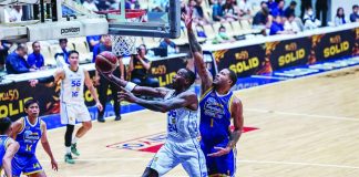 TNT Tropang 5G import Rondae Hollis-Jefferson attacks the basket against Magnolia Chicken Timplados Hotshots defender KJ Buffen during Game 1 of their PBA Governors’ Cup quarterfinal series. PBA