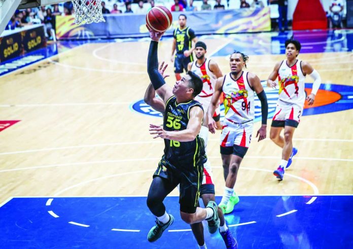 Roger Pogoy sparked TNT Tropang 5G’s furious second-half comeback, scoring 21 points to lead the Tropang 5G to a 116-98 rout of San Miguel Beermen in the PBA Governors’ Cup. PBA