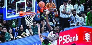 University of the Philippines Fighting Maroons’ Kingsly Udodo attacks the defense of De La Salle University Green Archers for an inside basket during their UAAP Season 89 men’s basketball clash at the SM Mall of Asia Arena. UAAP